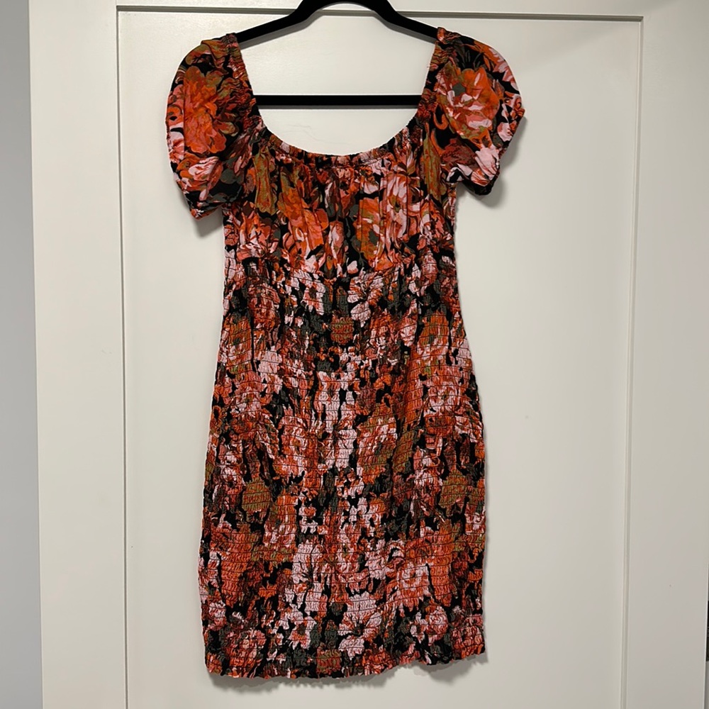 Floral smocked dress by free people- EUC only worn once